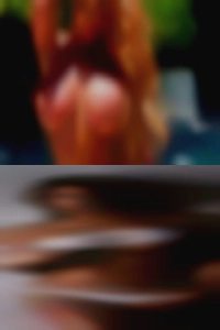 Porno Star w/ naked woman big Boobs.